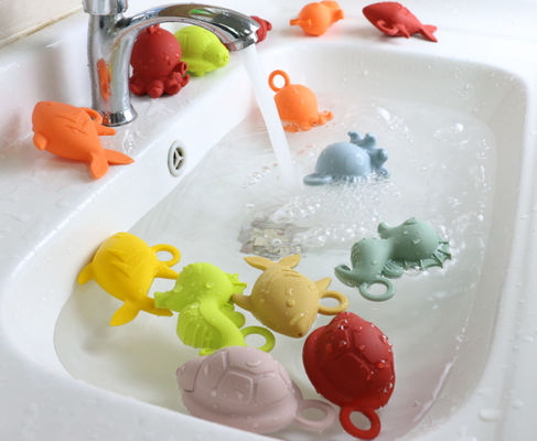 Shiny Colors Rubber Baby Silicone Toys BPA Free For Baby Water Floating