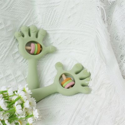 ODM Baby Silicone Toys Age Group Babies Kids Children Rattle Palm Hand Shape